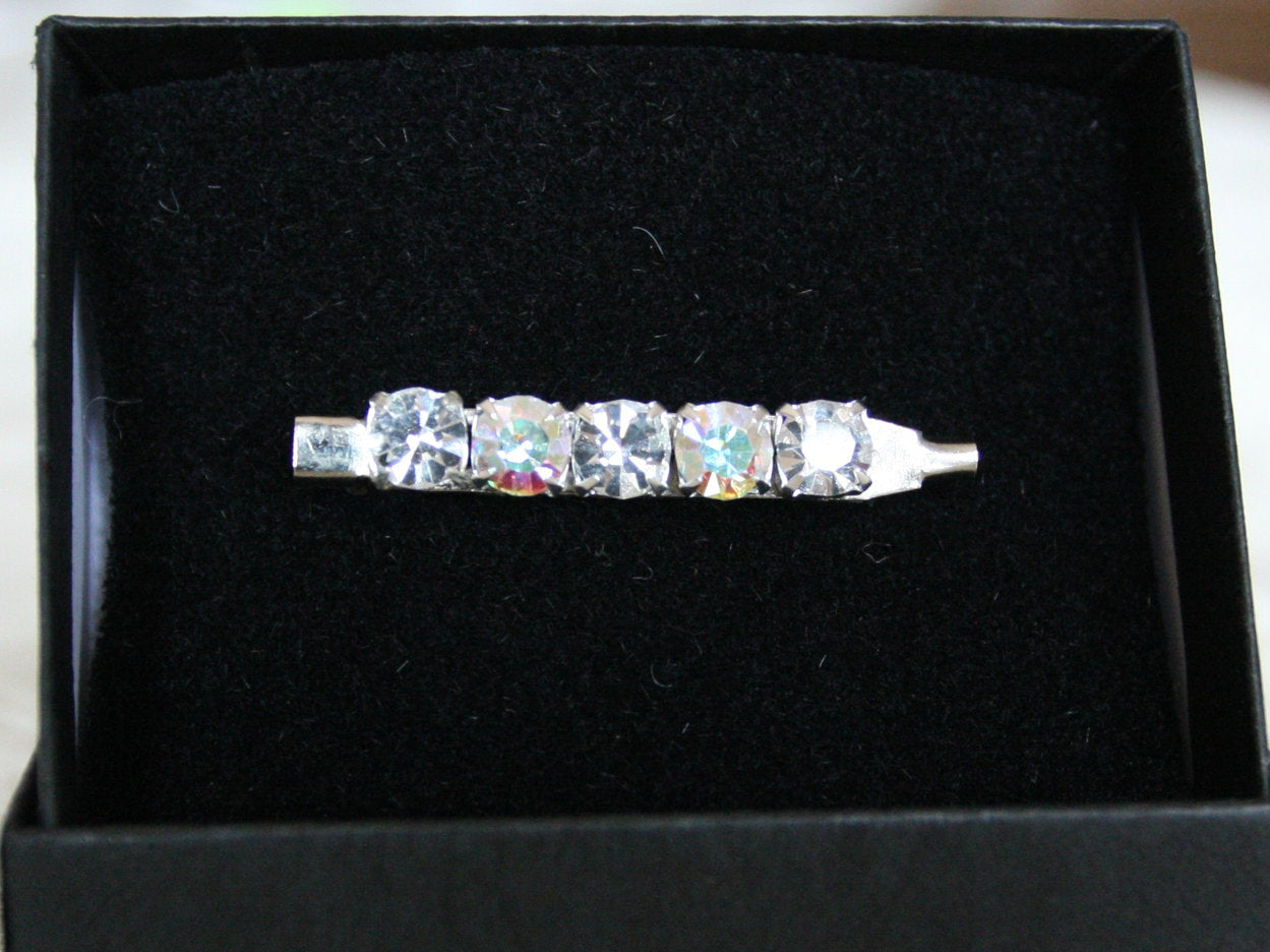 Clear and iridescent stock pin